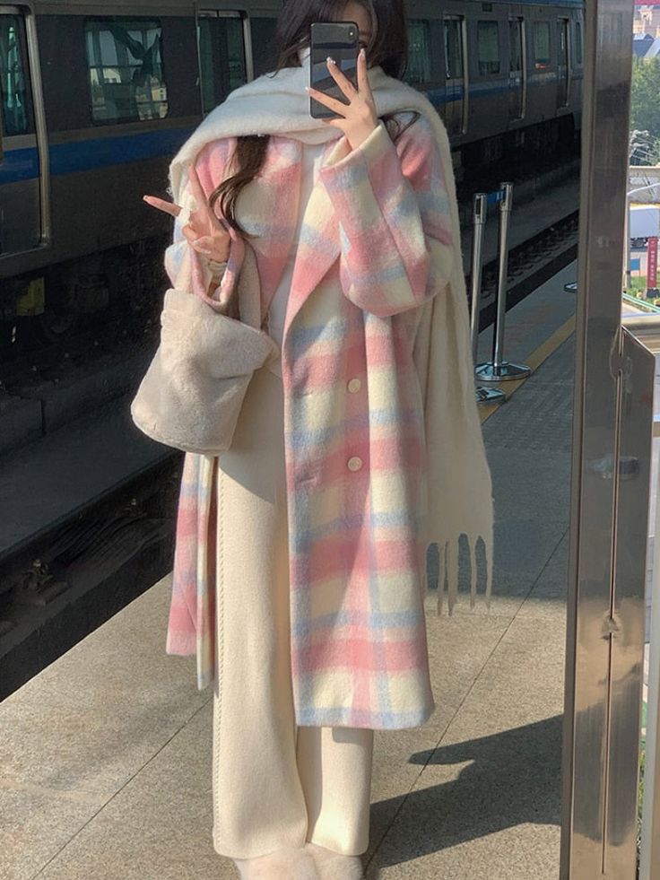 Bring some color into winter with this Long Plaid Rainbow Coat! This coat adds a vibrant touch to any cold-weather look, making it a stylish choice for any wardrobe. Size Chart: Size Bust (cm) Shoulder (cm) Sleeve (cm) Length (cm) Bust (in) Shoulder (in) Sleeve (in) Length (in) S 100 60 42 90 39.37 23.62 16.54 35.43 M Vinter Mode Outfits, Korean Fashion Office, Pink Winter Coat, Winter Mode Outfits, Woolen Coat Woman, Modest Outfit, Uni Outfits, Long Coats, Women Overcoat