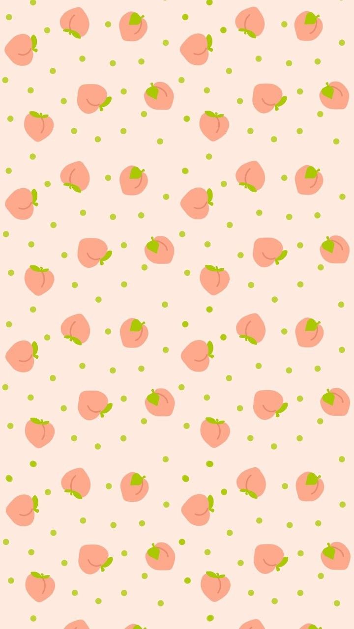 a pink and green wallpaper with lots of small dots on the bottom half of it