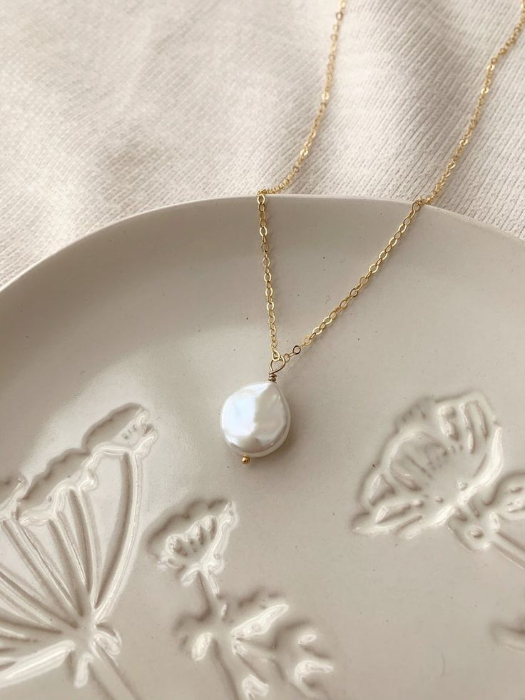 Coin Pearl Necklace 14K Gold Filled Flat Pearl Necklace - Etsy Flat Pearl Necklace, Gold Necklaces With Pearl Drop In 14k Gold Filled, 14k Gold-filled Necklace With Pearl Drop, Gold Necklace With Pearl Drop In 14k Gold Filled, Gold Wedding Necklace With Pearl Chain, Yellow Gold Necklace With Delicate Chain For Wedding, Yellow Gold Pearl Drop Necklace For Wedding, Classic Pendant Bridal Necklace As Gift, Classic Pendant Bridal Necklace Gift