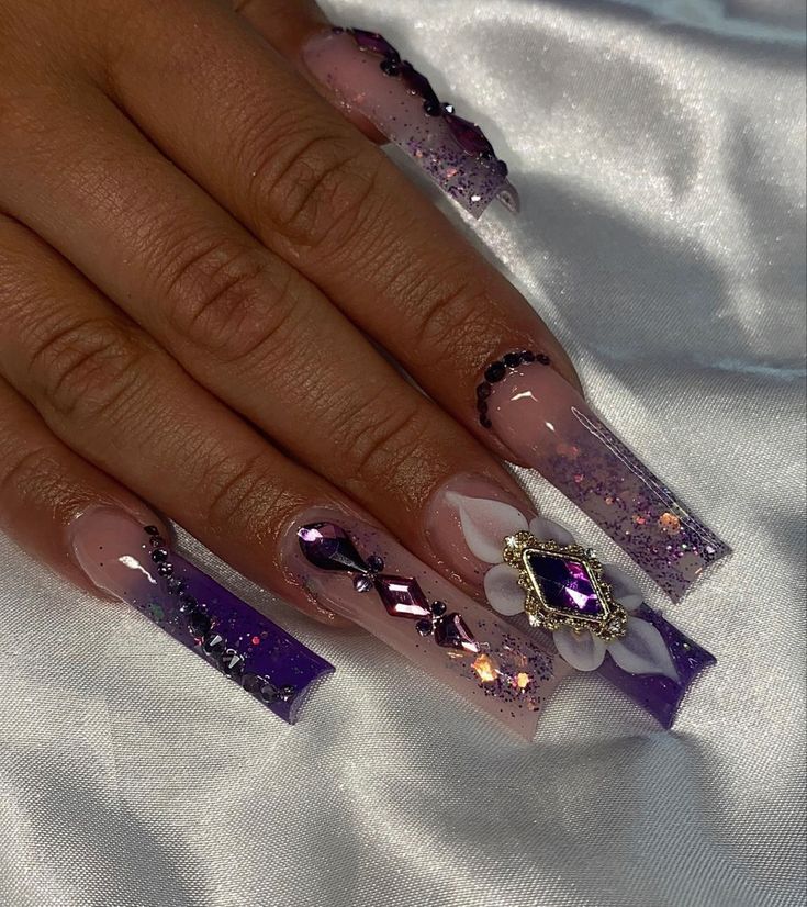 Dark Purple Nail Sets, Amethyst Acrylic Nails, Purple And Navy Blue Nails, Prom Nails For Dark Purple Dress, Quince Nails Purple And Gold, Baddie Bling Nails Purple, Dark Purple Baddie Nails, Prom Nails Purple Dark, Purple And Black Prom Nails