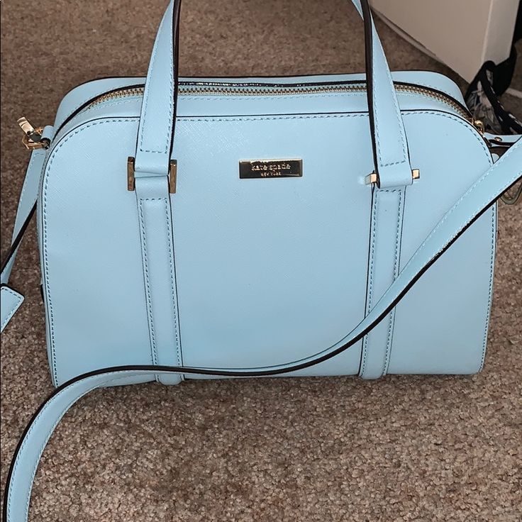 Baby Blue Kate Spade With Tags Still On It! Adjustable/Removable Long Cross Body Strap. Designer Blue Satchel With Adjustable Strap, Designer Light Blue Bag With Detachable Strap, Light Blue Office Bag With Detachable Strap, Designer Light Blue Bags With Detachable Strap, Designer Light Blue Bag With Detachable Handle, Light Blue Formal Crossbody Bag, Formal Light Blue Crossbody Bag, Designer Blue Satchel With Detachable Strap, Designer Light Blue Shoulder Bag With Detachable Strap