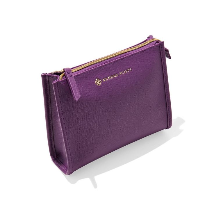 a small purple purse on a white background