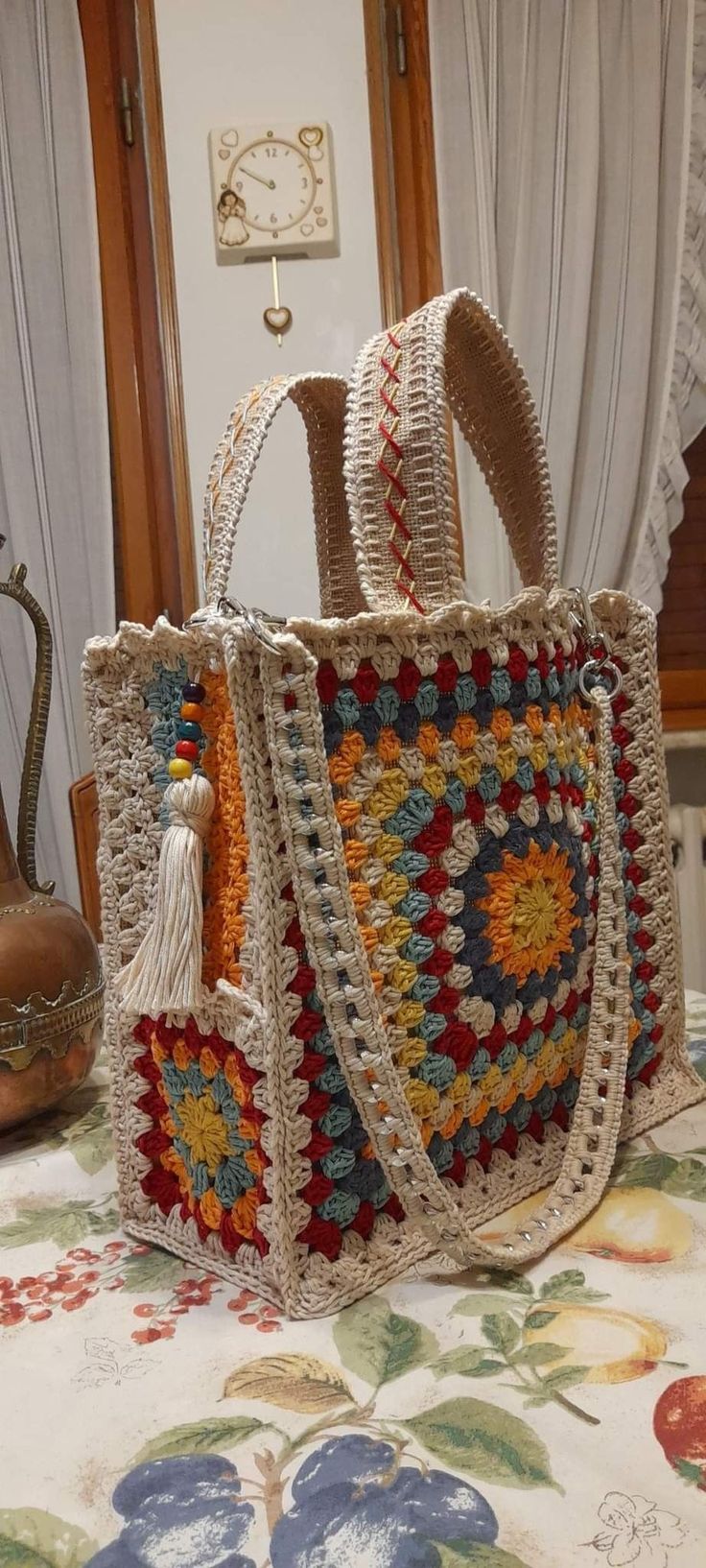 a crocheted bag sitting on top of a table