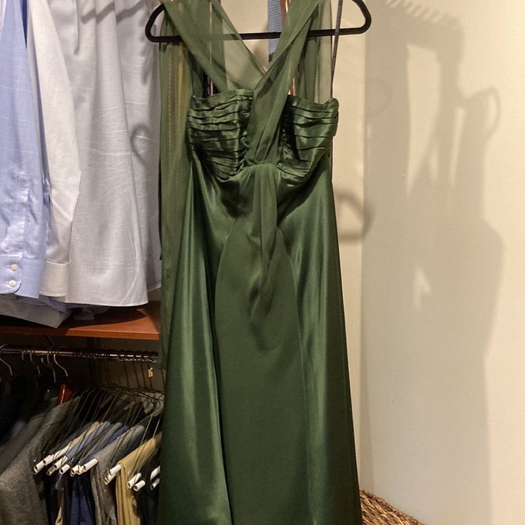 This Dress Is A True Sz 4. Silky/Satin Like Fabric W/Chiffon Overlay. Deep Dark Green Color. Never Worn (No Tag Though). I Have Dry Cleaned It Since It Gathered Dust In My Closet. Pic#2 Color Is Pretty Close. Green Satin Finish Bridesmaid Dress, Green Silk Evening Dress With Pleated Bodice, Green Satin Finish Dress, Green Satin Gown With Pleated Bodice, Green Silk Dress With Pleated Bodice, Green Satin Finish Formal Dress, Green Satin Finish Dress For Formal Occasions, Green Satin Finish Party Dresses, Green Satin Dress With Fitted Bodice For Formal Events