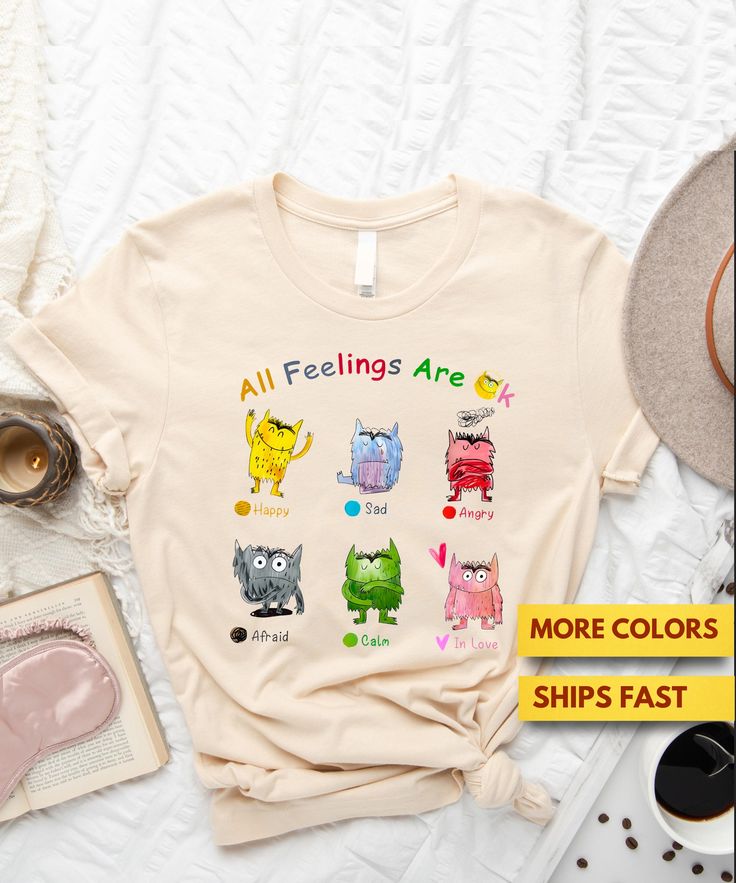 All Feelings Are Ok Teacher Shirt, Mental Health Shirt, Counselor Shirt, Psychology Shirt, Therapy Shirt, Monster Shirt Ultra Soft Tee Hello! Laura this side. So glad to meet you! We are a small initiative by my husband and me- a 1960s-born couple trying to bring back the Good Old Days to those who miss them, along with other fun T-Shirts. Our top priority here is the satisfaction of our customers. Most of our customers come back to our store and order again (around 70% of them)! I am sure you and your loved ones will love our soft T-Shirts with amazing designs! High-quality, soft, and comfortable 100% cotton T-Shirts. Made using DTG (Direct to Garment) printing method. Pre-shrunk and true to size. When you're absolutely on the fence, go for the bigger size otherwise stick to your original Outfit Escuela, Psychology Shirts, Counselor Shirt, Monster Shirt, Therapy Shirt, Monster Tshirt, Health Shirt, Good Old Days, Shop Ideas