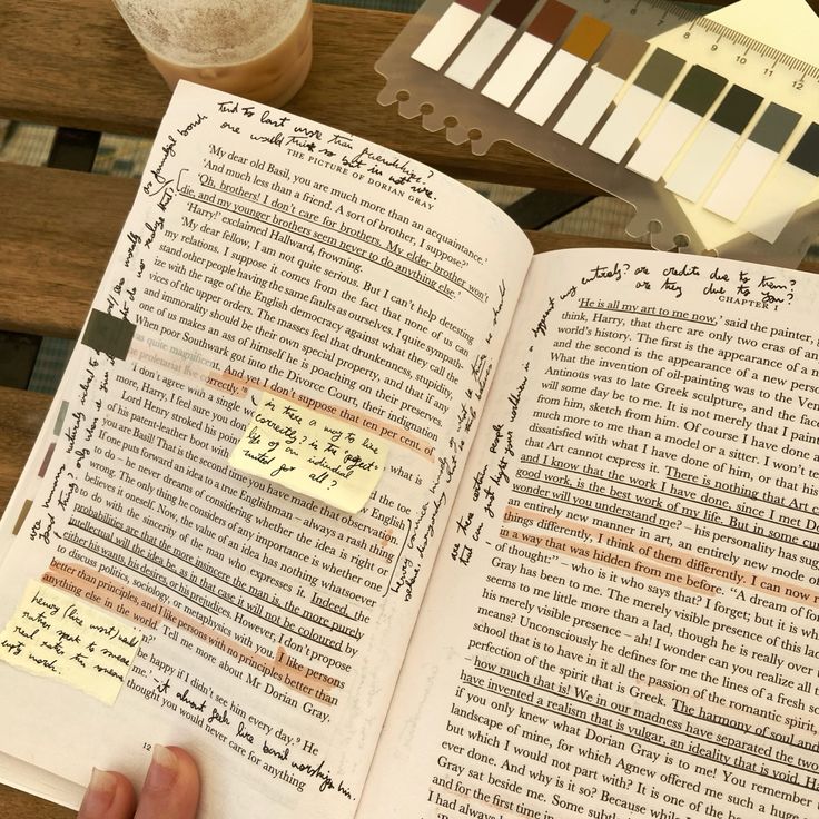 an open book sitting on top of a wooden table