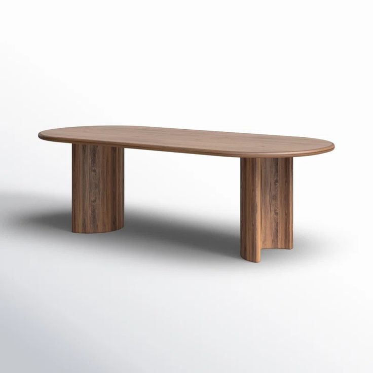 a wooden table sitting on top of a white floor