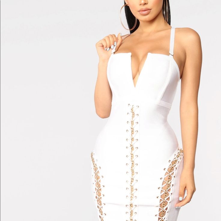 Hold It Together Bandage Dress -White Adjustable Straps Bandage Stretch Back Zip Metal Detail 35" Length 90% Polyester 10% Spandex White Stretch Bandage Mini Dress, White Stretch Bandage Bodycon Dress, White Stretch Bandage Dress For Spring, White Bandage Mini Dress For Club, White Bandage Bodycon Dress For Night Out, White Bandage Mini Dress For Spring, White Bandage Dress For Summer, White Bandage Mini Bodycon Dress, White Bandage Mini-length Bodycon Dress