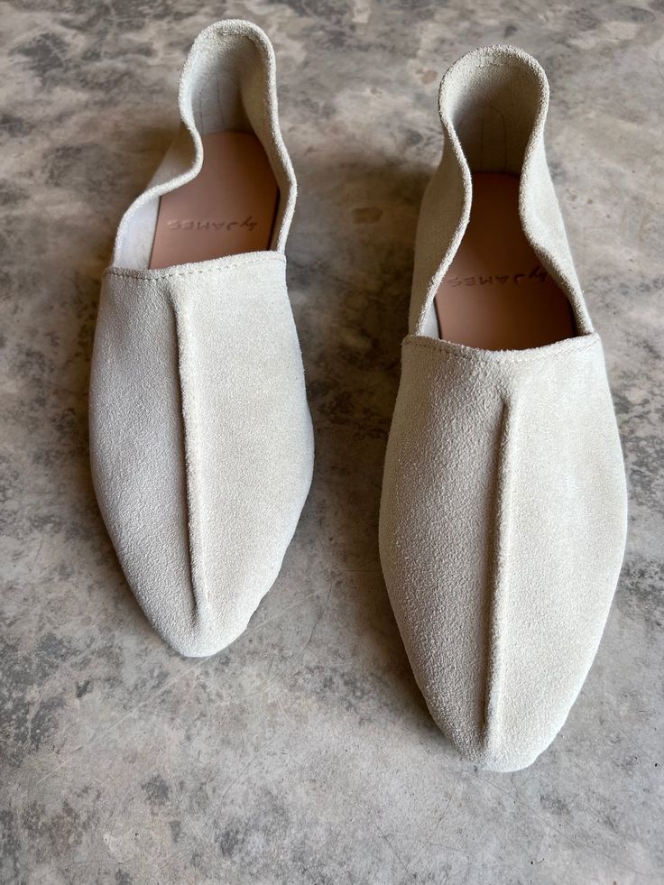 Leigh Slides - Moroccan Leather Slippers | byJAMES Suede Slip-ons With Suede Lining And Closed Toe, Beige Pointed Toe Slip-ons With Leather Sole, Beige Suede Summer Loafers, Beige Suede Lined Slip-ons, Beige Suede Loafers For Summer, Summer Beige Suede Loafers, Medium Width Suede Slip-on Loafers, Chic Suede Closed Toe Flats, Chic Closed Toe Suede Flats