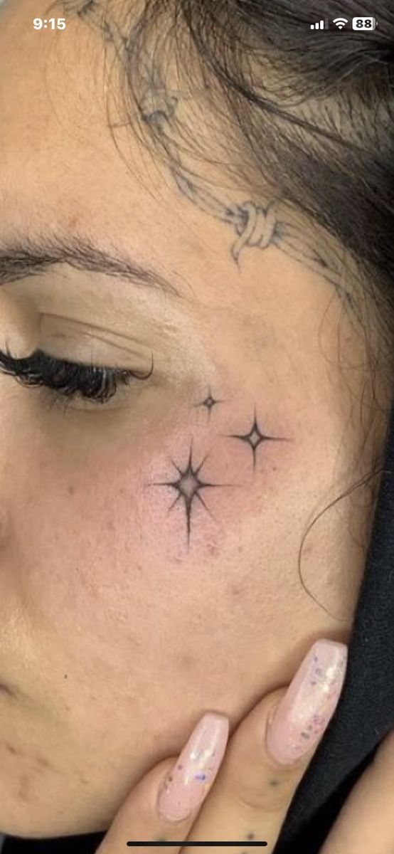 a woman with a star tattoo on her neck