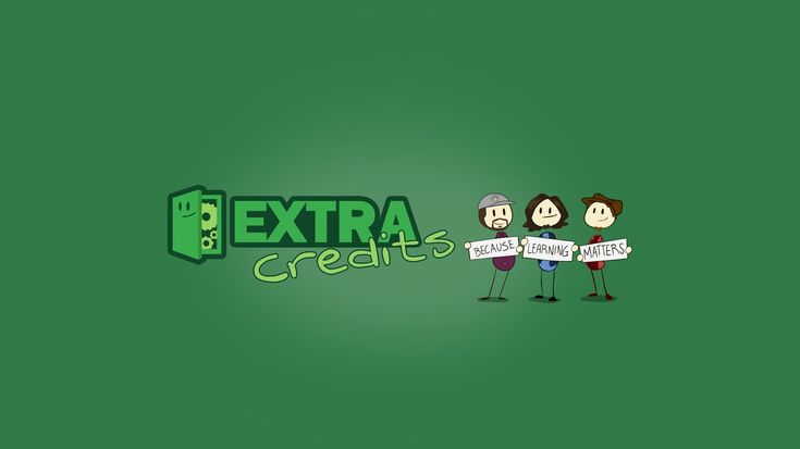 two people holding signs that say extra credits and the words are written in green letters