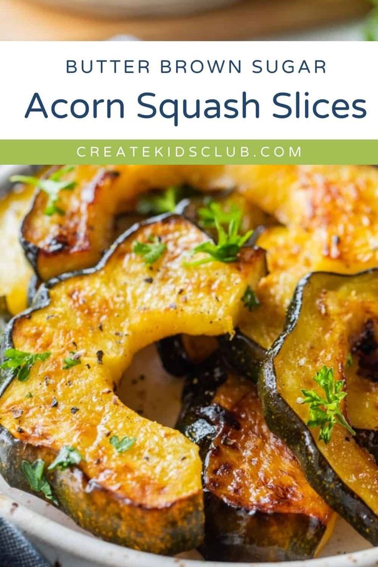 buttered brown sugar acorn squash slices in a white bowl with parsley on top