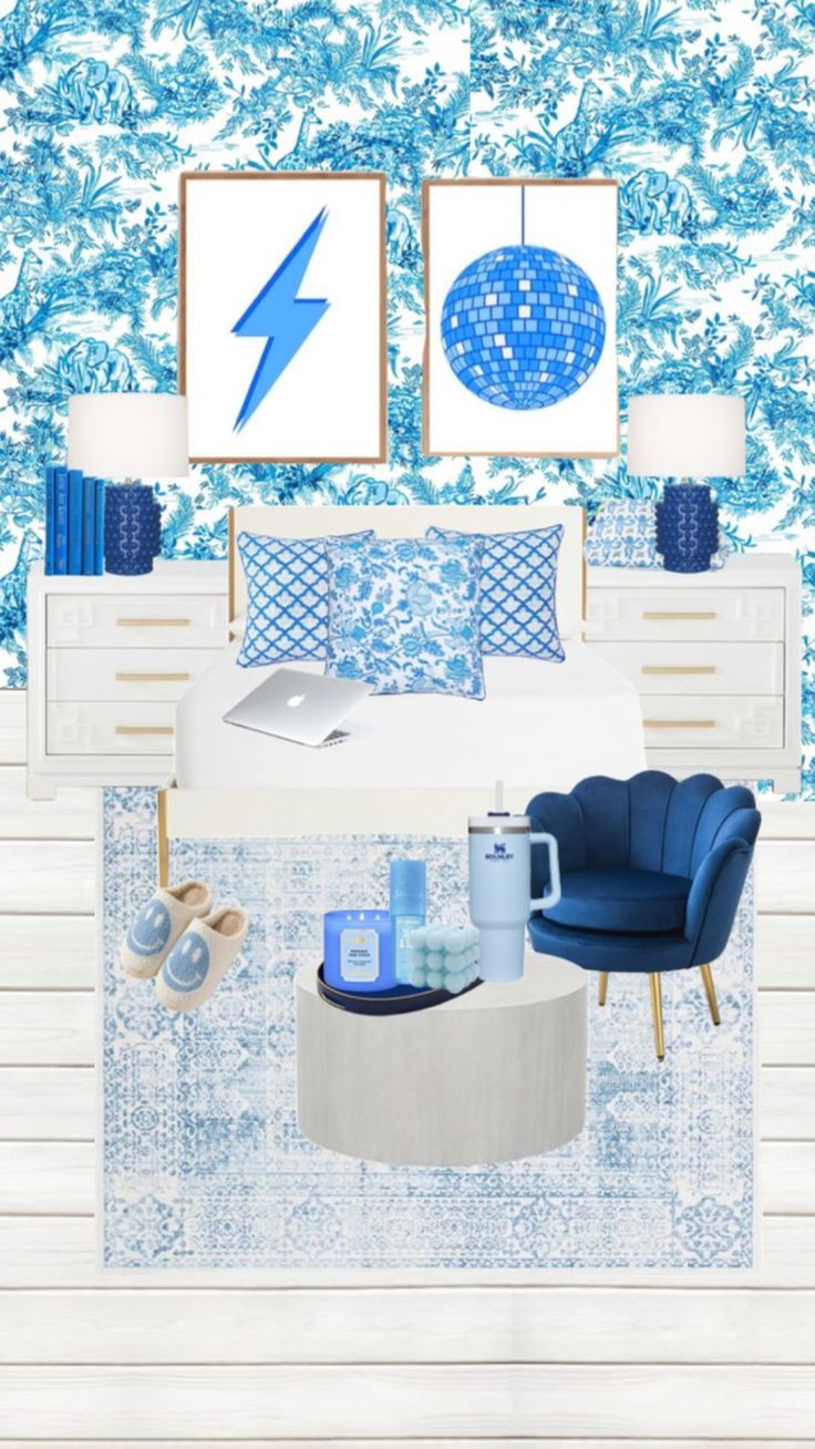 a bedroom with blue and white decor on the walls