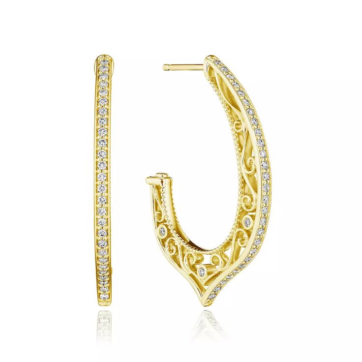 Adorn your ears with timeless elegance when you wear the Reverie Filigree Profile Diamond Hoop. Elevate your style with the intricate 18k gold filigree detailing on the profile, adorned with 0.45CTW diamonds. Indulge in luxury by choosing from 18K white, yellow, or rose gold. Explore our exquisite collection of fine fashion jewelry at your nearest IDC location. Luxury Pave Set Hoop Earrings For Wedding, Luxury Wedding Hoop Earrings With Pave Setting, Luxury Hoop Earrings With Pave Setting For Wedding, Luxury Earrings With Intricate Design, Elegant Pave Set Hoop Earrings, Elegant Diamond Cut Hoop Earrings For Everyday, Elegant Hoop Earrings With Pave Setting, Luxury Yellow Gold Cubic Zirconia Hoop Earrings, Elegant White Gold Hoop Earrings With Pave Setting