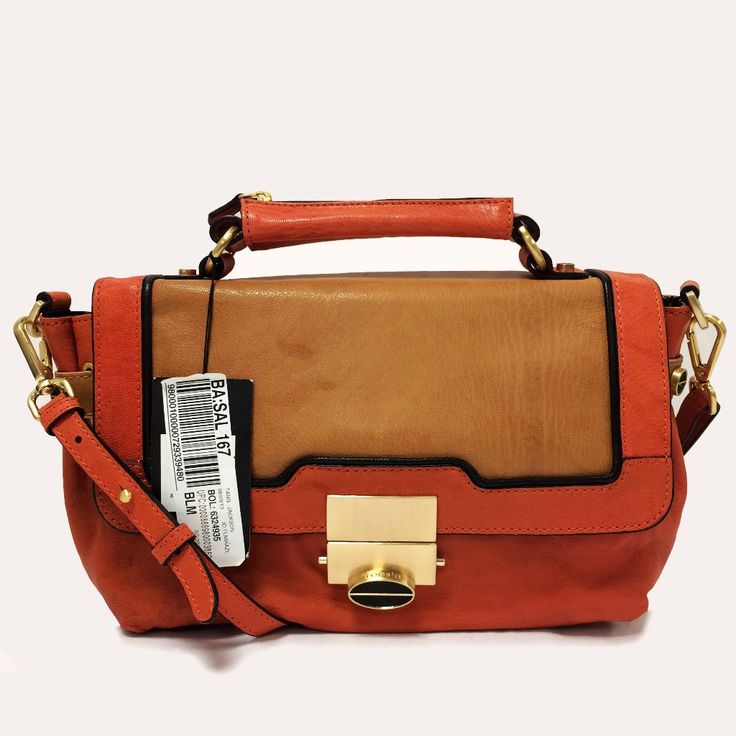 Description: Color: Tangerine Type Of Material: Leather Type Of Trim: Tan Leather Color Of Hardware: Gold Tone Type Of Closure: Top Flap Type Of Handle: Top Handle With 2 “Drop Type Of Strap: Detachable Strap With 18.5” Drop Exterior Details: - Treesje Logo Engraved Pinch Lock Interior Information: - Fully Lined - Single Zip Pocket - Two Slip Pockets Condition: - Light Scuff Marks On Hardware - Slight Areas Of Discoloration On Bags Exterior Caramel Satchel Bag With Detachable Strap, Caramel Satchel Shoulder Bag With Detachable Strap, Cognac Leather Satchel With Gold-tone Hardware, Cognac Top Handle Satchel For Shopping, Cognac Satchel Flap Bag With Detachable Handle, Chic Flap Bags With Leather Handles, Formal Brandy Leather Bag, Formal Brandy-colored Leather Bags, Caramel Top Handle Bag With Detachable Strap