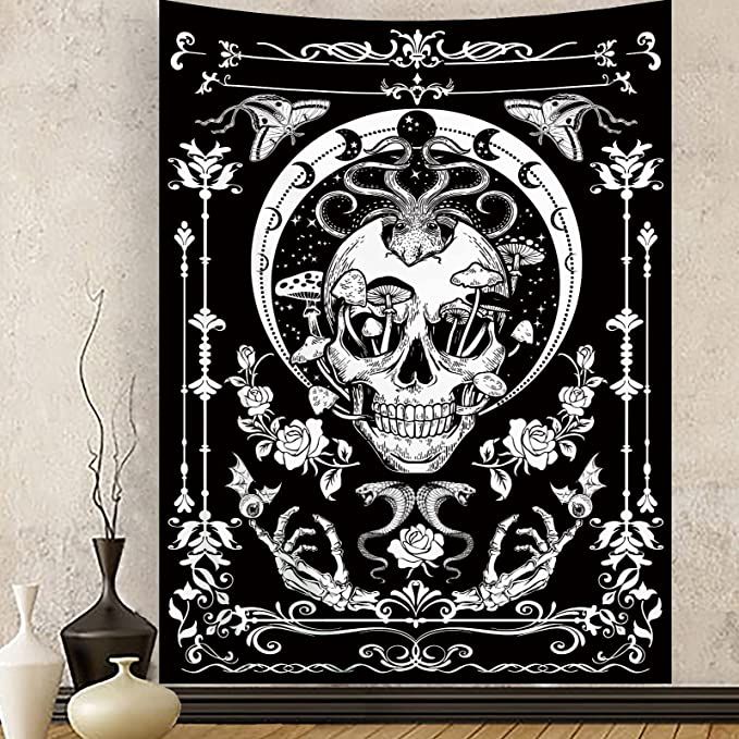 a black and white poster with a skull in the center on a wall next to vases