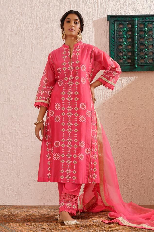 Pink three fourth sleeves centre panel block printed kurta in chanderi base with lace detailing sleeves. Paired with lace and block print detailing straight pant and organza dupatta with gold and same coloured lace.
Components: 3
Pattern: Print
Type Of Work: Floral Block
Neckline: Mandarin Collar
Sleeve Type: Three Fourth
Fabric: Chanderi
Color: Pink
Other Details: 
Attached inner lining
Model Height: 5ft 4inches, wearing size S
Occasion: Puja, Mehendi and Haldi - Aza Fashions Cotton Silk Kurta With Block Print, Anarkali Palazzo Set With Block Print And Long Sleeve, Eid Festive Block Print Palazzo Set, Unstitched Block Print Palazzo Set For Festive Occasions, Transitional Chanderi Kurta With Block Print, Designer Block Print Kurta For Eid, Unstitched Festive Palazzo Set With Block Print, Designer Wear Block Print Kurta For Eid, Cotton Silk Lawn Suit With Block Print