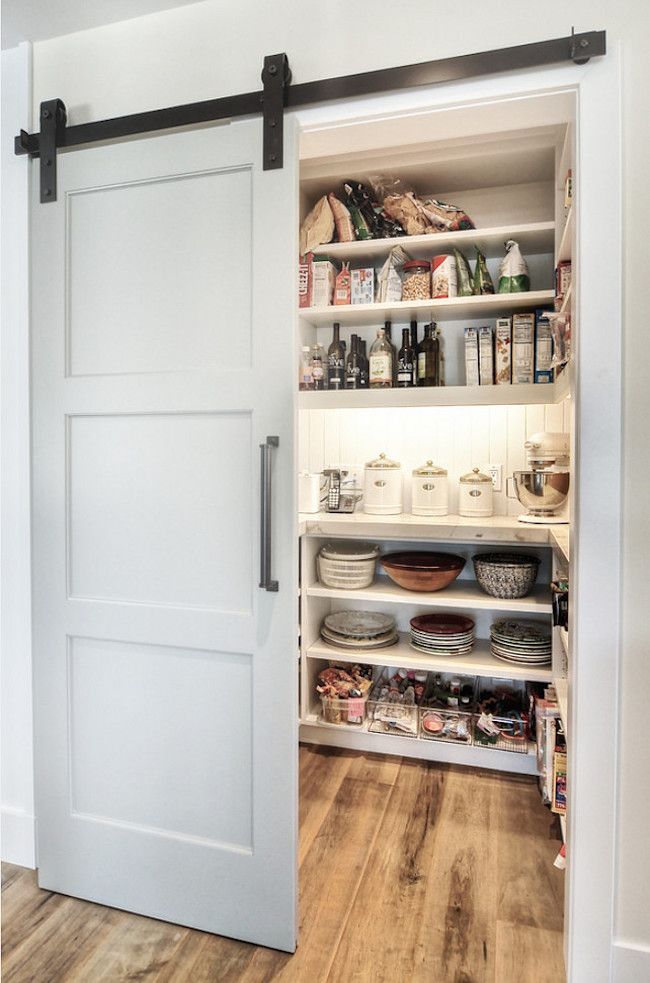 an open pantry with lots of food in it