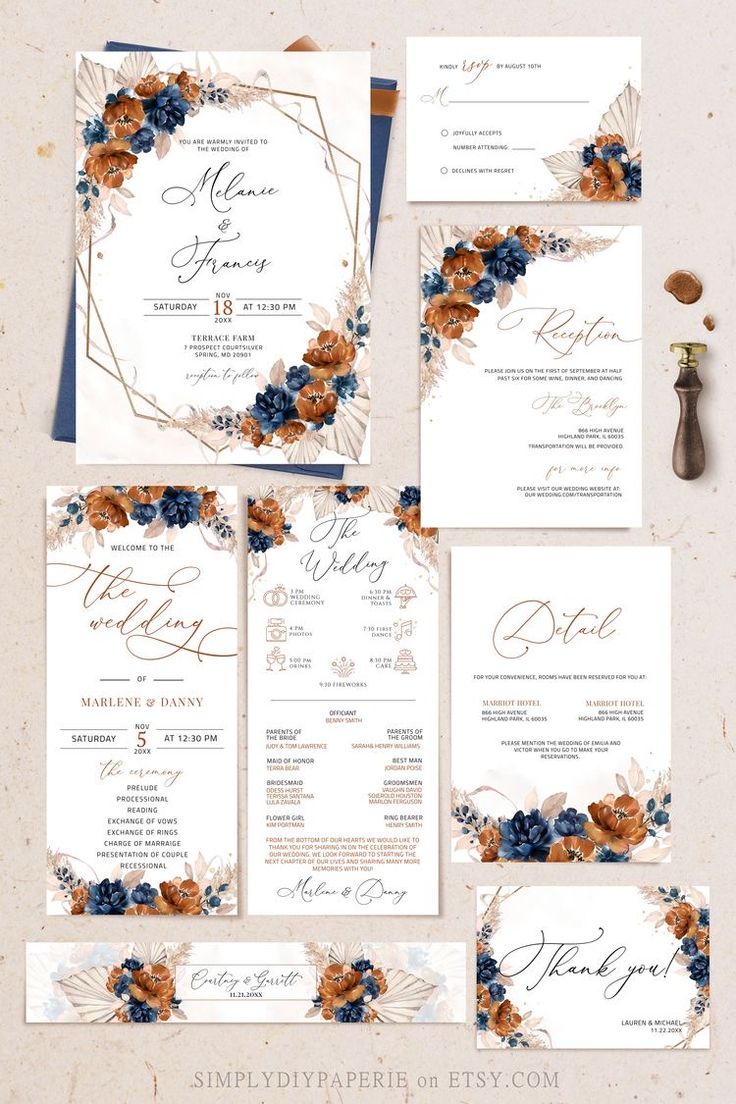 wedding stationery set with flowers and leaves on the front, navy blue and orange