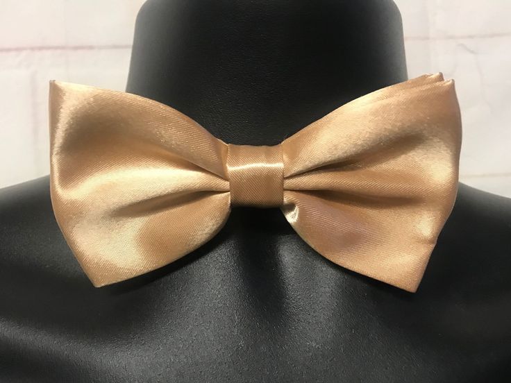 "Mens pre-tied, adjustable, satin gold  bow tie. This silk blend bow tie measures  4 1/2\"x 2 1/2\" Thanks for visiting our shop! JJ100" Gold Bowtie, Gold Bow Tie, Italian Suit, Gold Tie, Mens Gold, Satin Bow, Tie Accessories, Suit And Tie, Bow Ties