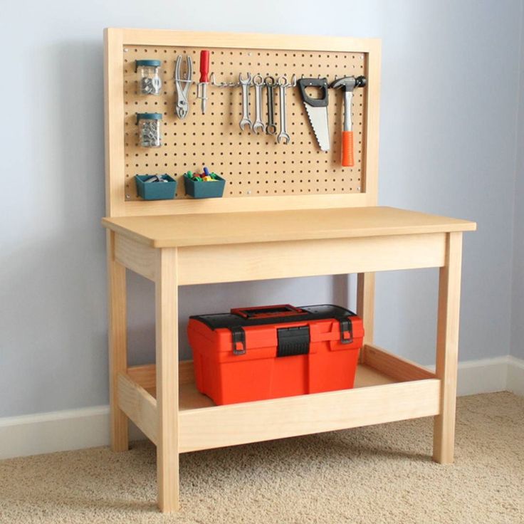 a wooden bench with tools on it