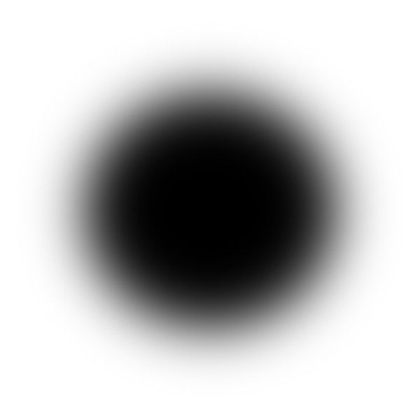 a black and white image of a dark hole