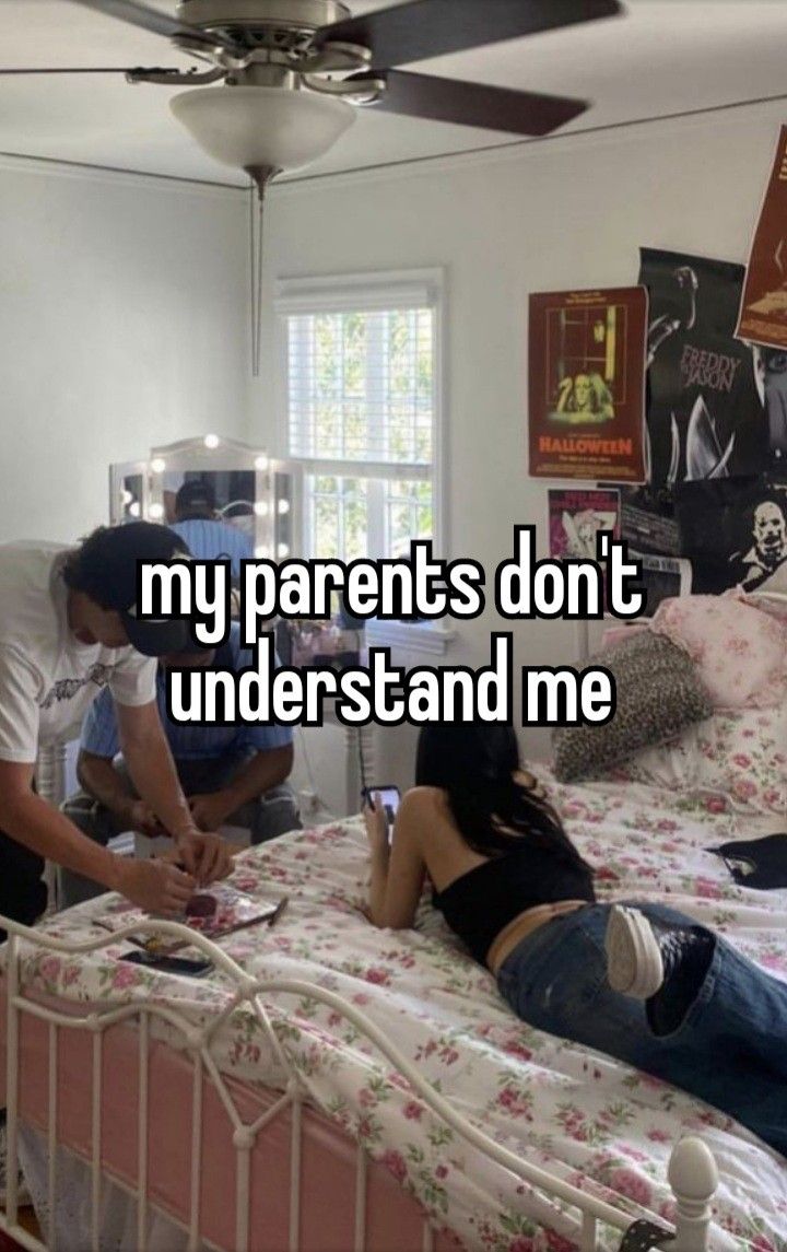 two people sitting on a bed with the caption my parents don't understand me