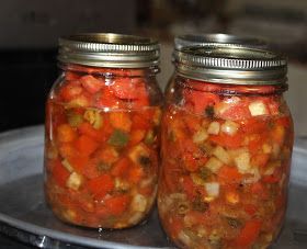 two jars filled with food sitting on top of a metal tray