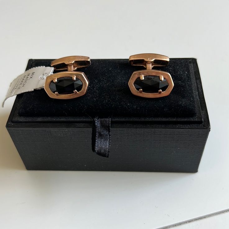 These Cuff Links In Gold And Onyx Are The Finishing Touch Every Suit Needs. Our Signature Kendra Scott Shape Pairs With Sleek, High-Polished Metals To Create An Elevated Accessory That’s Ready To Take Your Formal Looks To The Next Level. New With Tags. Never Worn In The Signature Velvet Box. Would Be A Great Gift. Stone Is 6/8" In Width Luxury Black Jewelry For Office, Timeless Black Jewelry For Business, Luxury Black Office Jewelry, Elegant Cufflinks For Workwear, Elegant Adjustable Jewelry For Office, Modern Cuff Jewelry For Office, Modern Cuff Jewelry For The Office, Elegant Black Cufflinks For Office, Luxury Black Jewelry For Workwear