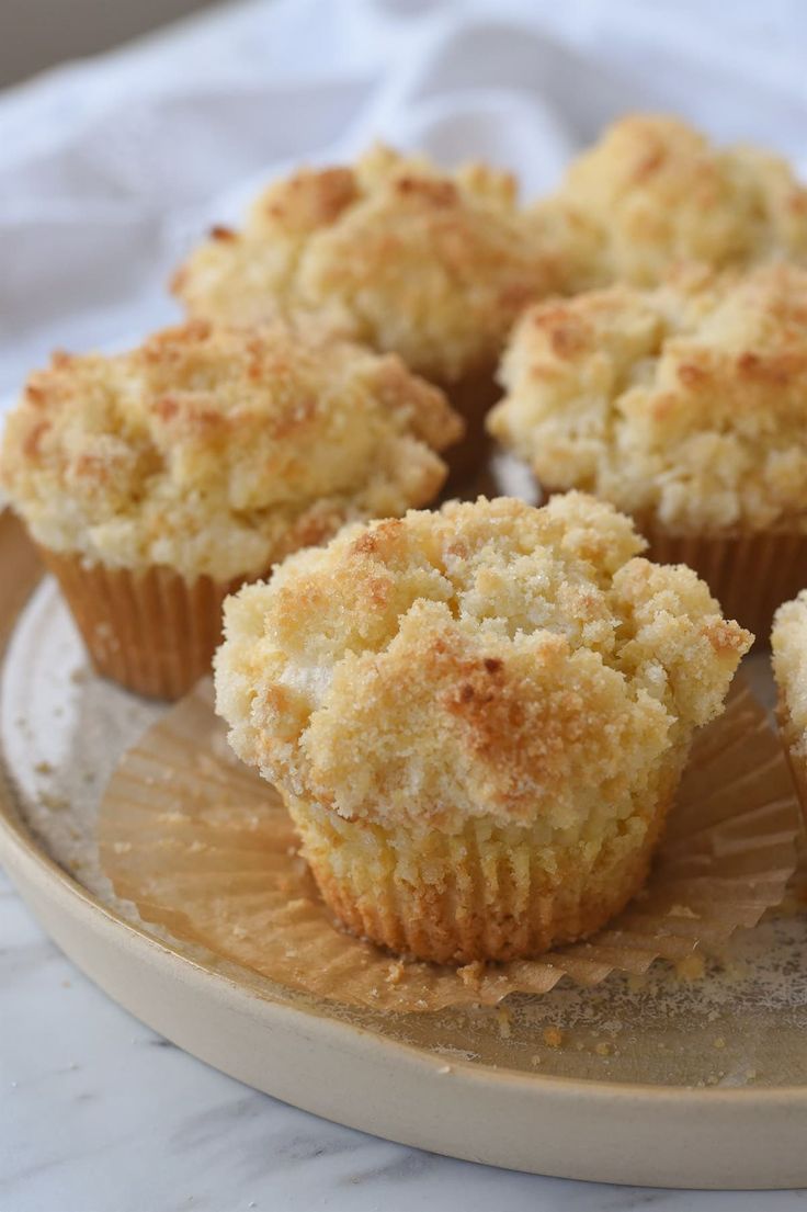 some muffins are sitting on a plate and ready to be eaten or eaten