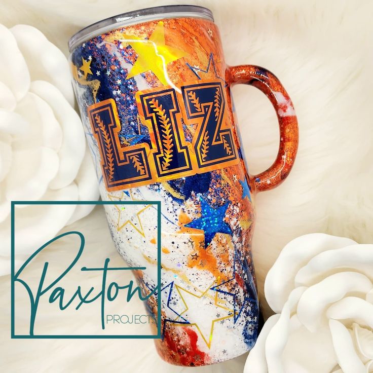 a coffee cup with the word hyz painted on it