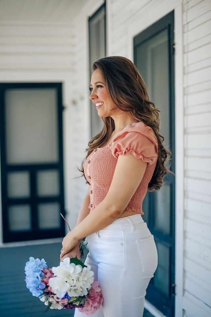 Easy to style in the summer and cute to pair with denim jeans or shorts. Our smocked crop top will be your go to casual outfit this summer. Smocked crop top Stretchy fit Button detailing down front Square neckline True to size Also available in Coffee Paige is 5'3, wears a size 2-4 and is wearing a Small! Affordable Feminine Spring Crop Top, Cheap Feminine Crop Top For Spring, Cheap Feminine Spring Crop Top, Cheap Stretch Smocked Top For Summer, Feminine Stretch Crop Top, Affordable, Cheap Casual Smocked Top With Smocked Cuffs, Cheap Smocked Bodice Crop Top, Cheap Casual Solid Smocked Top, Summer Crop Top With Smocked Bodice For Day Out