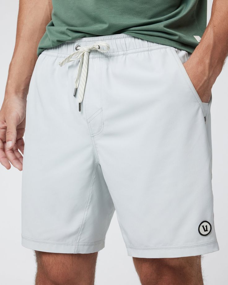 One short for every sport, the Kore Shorts have a classic athletic fit, falling just above the knee with an anywhere and everywhere versatility. Go commando in confidence with the breathable, boxer-brief liner. | Vuori Kore Shorts | Sky Grey | Large Vuori makes premium performance apparel inspired by the active Coastal California lifestyle; an integration of fitness, surf, sport, and art. Breaking down the boundaries of traditional activewear, we are a new perspective on performance apparel. White Sporty Swim Trunks For Outdoor, White Sporty Outdoor Swim Trunks, Sporty White Outdoor Swim Trunks, Sporty Recycled Polyester Athletic Shorts For Summer, Sporty Moisture-wicking Bottoms For Everyday, Sporty Swim Trunks With Go-dry Relaxed Fit, Sporty Swim Trunks With Go-dry Technology And Relaxed Fit, Sporty Relaxed Fit Swim Trunks With Go-dry Technology, Sporty Relaxed Fit Swim Trunks