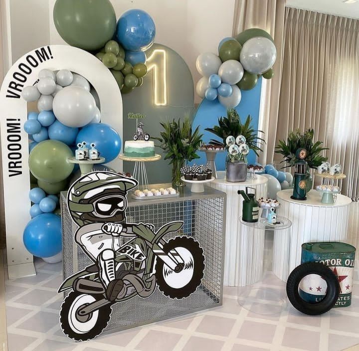 a motorcycle themed birthday party with balloons and decorations