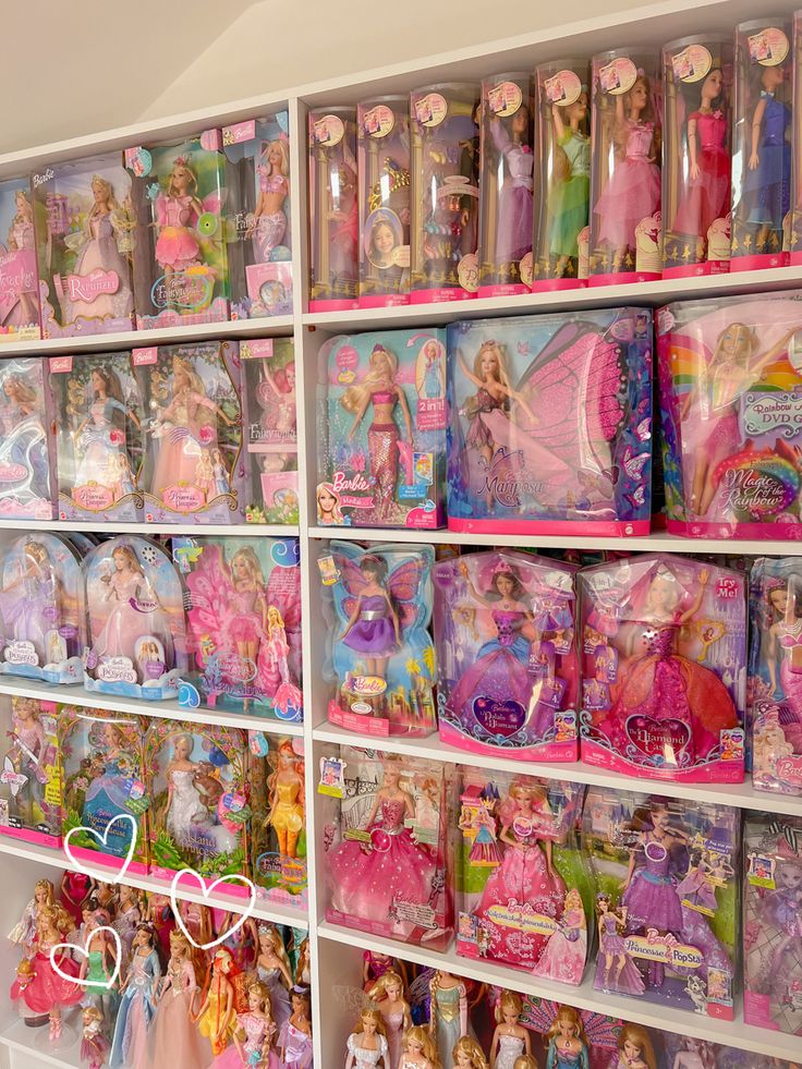 the shelves are full of barbie dolls and other toys