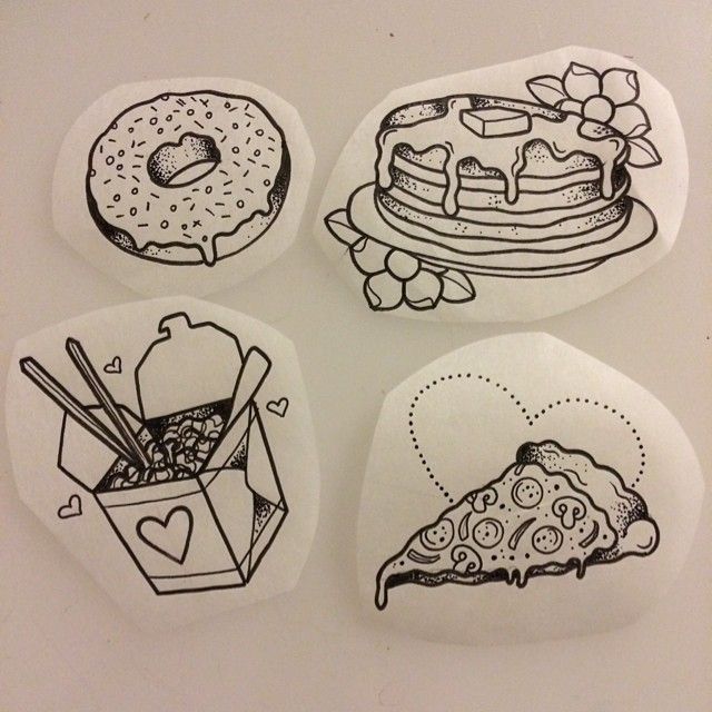 four plates with drawings of food on them