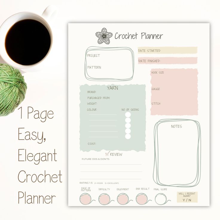 a crochet planner next to a cup of coffee and a ball of yarn