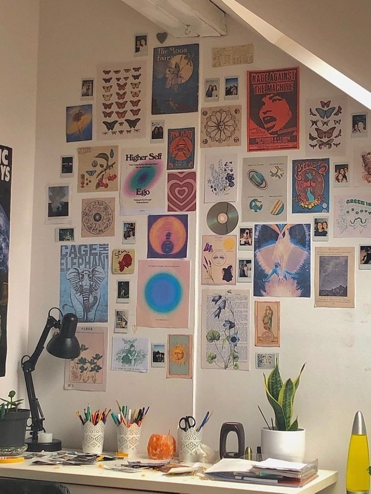 an office with lots of art on the wall