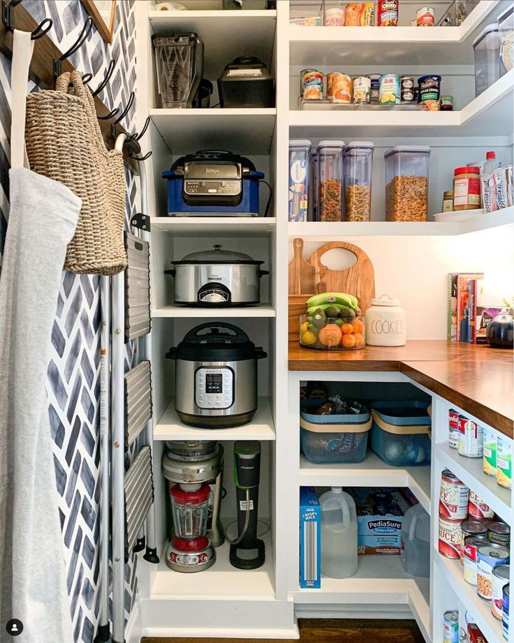 an organized pantry with lots of food in it