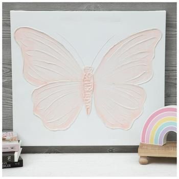 a white butterfly with pink wings on a wall next to a rainbow and wooden toy