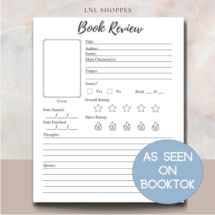 the printable book review sheet is shown in front of a marble background with a blue circle