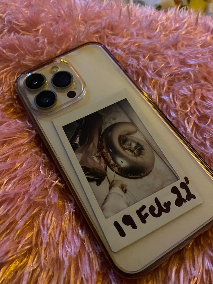 a cell phone case with an image of a baby on it