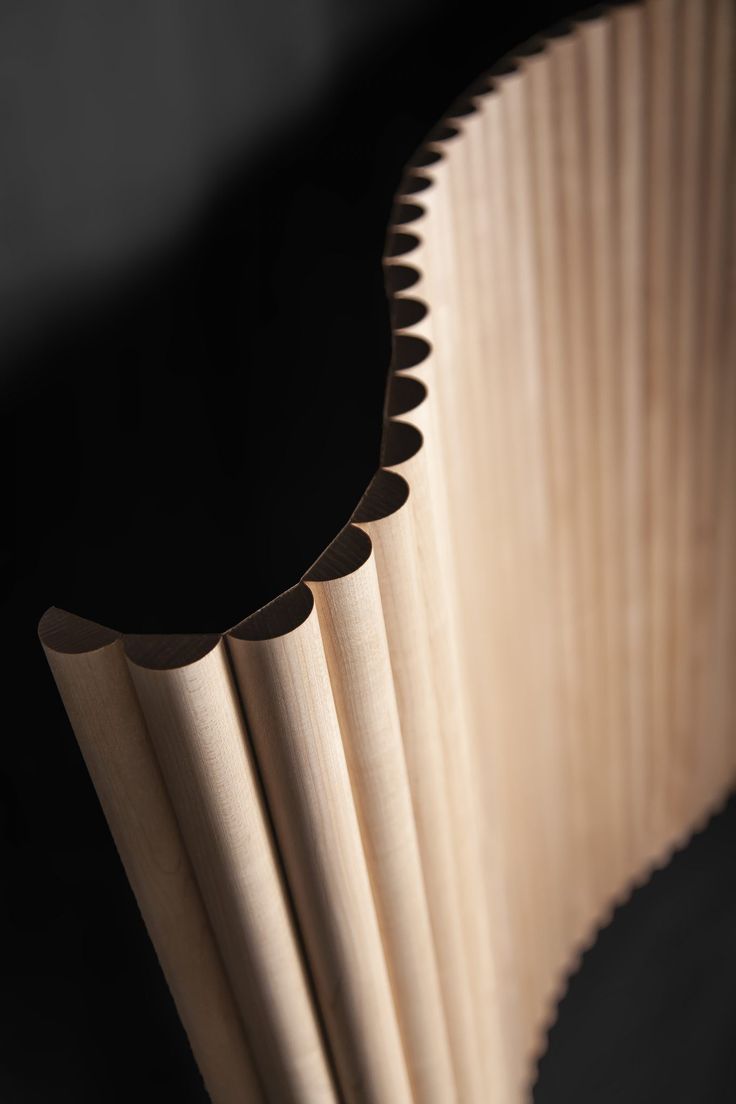 the back side of an umbrella made out of wood