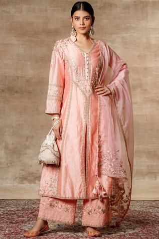 Peach flared kurta with panelled floral motifs. Comes with palazzo pants and organza dupatta.
Components: 3
Fabric: Chanderi
Neckline: Mandarin collar
Sleeve Length: Full
Color: Peach
Embroidered
Front slit
Embroidered dupatta with tassels
Closure: Kurta: Front buttons - Aza Fashions Kurta Palazzo Set, Tunics Online, A Line Kurta, Palazzo Set, Embroidered Dupatta, Organza Dupatta, Embroidered Neckline, Indian Fashion Designers, Embroidered Tunic