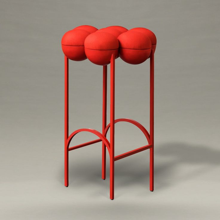 The Saturn barstool utilises gathered bilboquet seat construction, to create a more simplified but still incredibly distinctive form. The sumptuously undulating seat instantly appeals with its invitingly upholstered comfort, while the graceful supporting metalwork establishes the sense of floating and airiness. The chair's frame is in powder coated steel and it is upholstered with Italian wool fabric. The chair is made by hand so slight imperfections are part of its charm. Each piece of furniture is individually numbered and comes with a signed Certificate of authenticity to prove that it is Bohinc Studio original. Shipping: Please note that for all furniture items we will email you a separate shipping quote as those items need crating and specialist shipping. Delivery times vary depending Funky Stools, Bar Stools Colorful, Post Modern Bar Stools, Funky Seating, Funky Bar Stools, Red Bar Stools Kitchen Island, Futuristic Bar, Colorful Bar Stools, Living Room Decor Eclectic