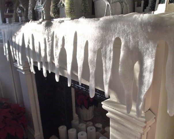 the mantle is covered in snow and icicles