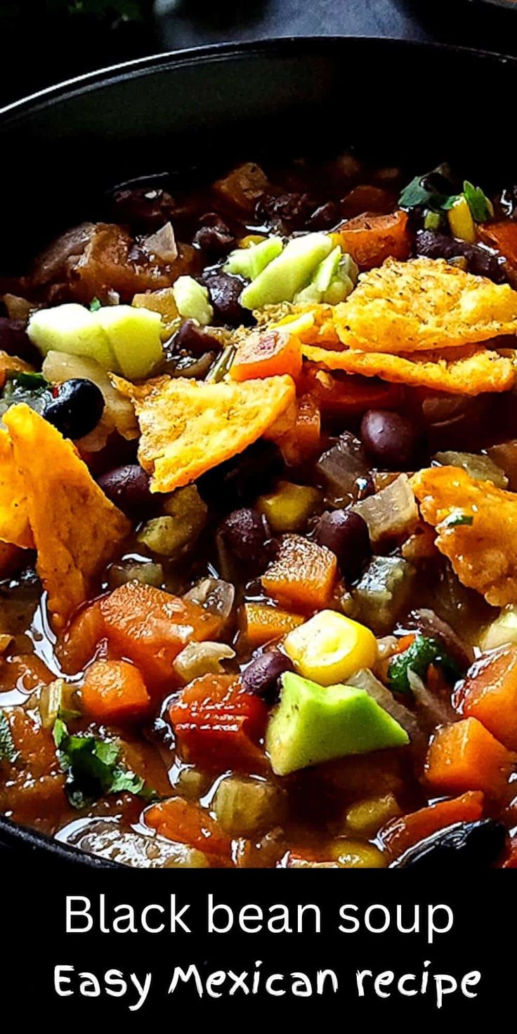 black bean soup in a cast iron skillet with tortilla chips