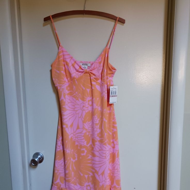 Never Worn Michael Kors Dress Size 12. Pink And Orange Floral Pink Lined Mini Dress For Day Out, Pink Lined Midi Dress For Beach, Pink Fitted Lined Sundress, Fitted Pink Lined Sundress, Pink Lined Summer Mini Dress, Pink Lined Midi Dress For Day Out, Lined Pink Mini Dress For The Beach, Pink Fitted Sundress For Spring, Fitted Pink Sundress For Spring