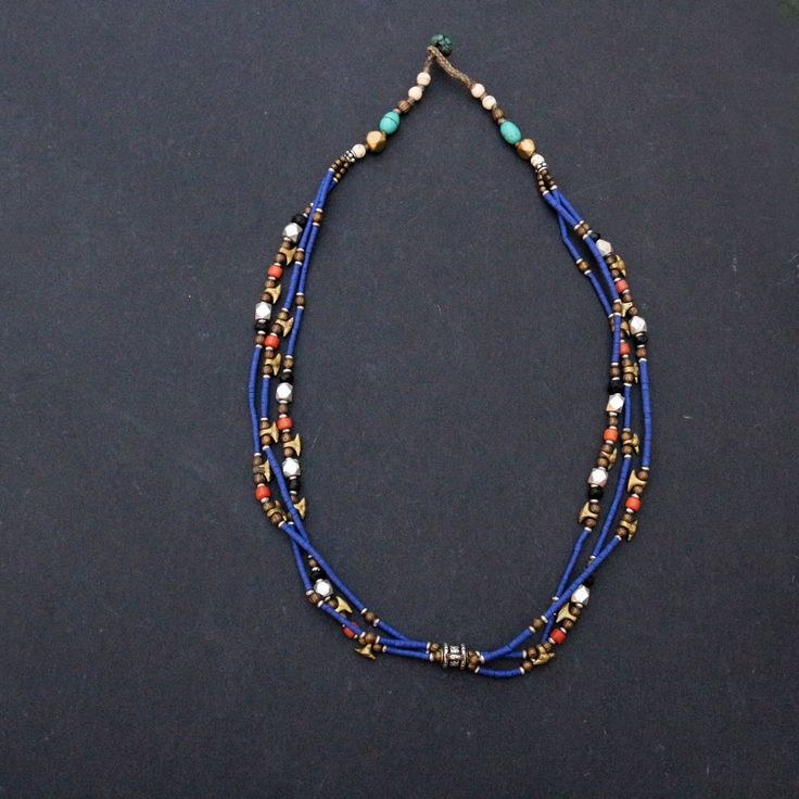 3 strands of Lapis lazuli , corals turquoise and brass beads necklace Approximately 19 inches long Blue Double Strand Bohemian Turquoise Necklace, Bohemian Double Strand Turquoise Necklace, Bohemian Blue Double Strand Turquoise Necklace, Blue Bohemian Double Strand Necklaces, Bohemian Blue Double Strand Necklaces, Bohemian Double Strand Blue Necklace, Blue Double Strand Jewelry With Tiny Beads, Blue Multi-strand Natural Stone Necklaces, Blue Multi-strand Natural Stone Necklace