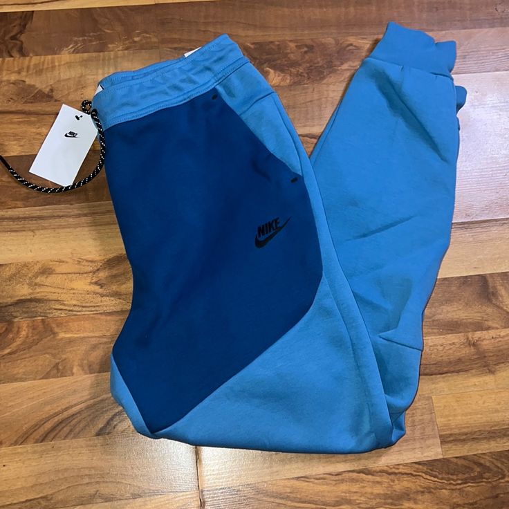 New Nike Tech Pack Tech Fleece Joggers Size: Medium, Xlarge Color: Blue Black Brand New With Tags Blue Fleece Sweats For Jogging, Blue Fleece Bottoms For Winter, Winter Blue Fleece Bottoms, Nike Blue Sweats For Loungewear, Nike Blue Athleisure Sweats, Nike Blue Sweats Athleisure Style, Blue Jogging Sweats With Pockets, Blue Sporty Sweats With Pockets, Casual Blue Nike Sweats